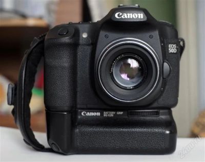 Лот: 2689417. Фото: 1. легендарный canon 50d + батарейная... Цифровые зеркальные