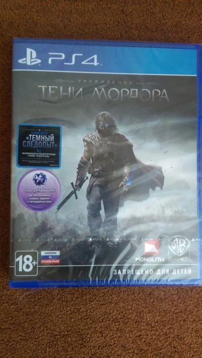 Лот: 5413556. Фото: 1. Средиземье: Тени Мордора (PS4... Игры для консолей