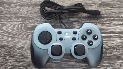 Лот: 17964912. Фото: 1. Геймпад Logitech Rumblepad 2... Рули, джойстики