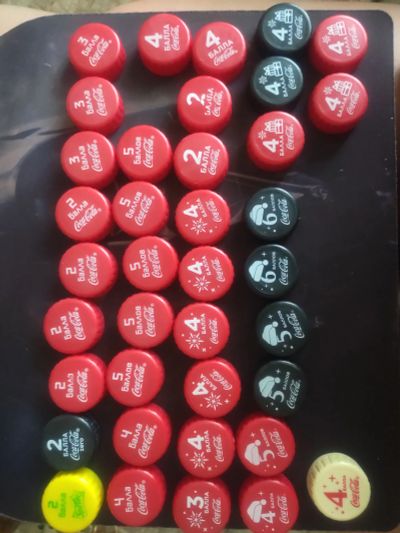 Лот: 16146797. Фото: 1. Баллы крышки Coca cola прошлогодние... Другое (значки, медали, жетоны)