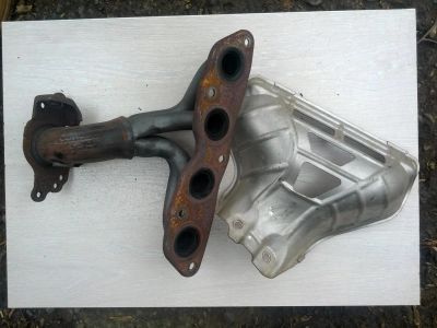 Лот: 3924935. Фото: 1. Выпускной коллектор toyota 2nz-fe. Двигатель и элементы двигателя