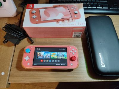 Лот: 19992715. Фото: 1. nintendo switch lite розовая. Игровые приставки, консоли