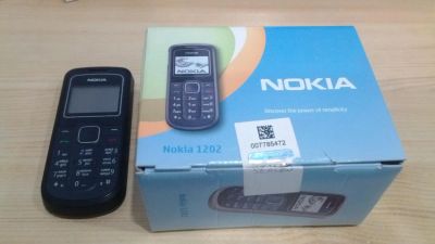 Лот: 4688496. Фото: 1. Nokia 1202 идеальное состояние. Кнопочные мобильные телефоны