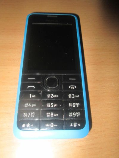 Лот: 4539427. Фото: 1. телефон nokia 301 голубой. Кнопочные мобильные телефоны