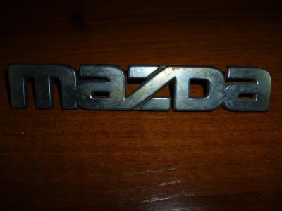 Лот: 4199480. Фото: 1. Шильдик MAZDA. Кузов