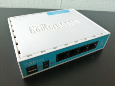 Лот: 20181308. Фото: 1. Роутер MikroTik hAP lite. Маршрутизаторы (роутеры)