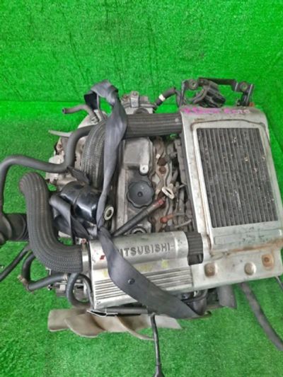 Лот: 19382550. Фото: 1. Двигатель Mitsubishi Pajero V26W... Двигатель и элементы двигателя