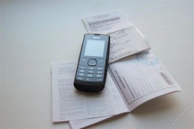 Лот: 1220609. Фото: 1. Продам Nokia X1-01 c 2-мя SIM. Кнопочные мобильные телефоны