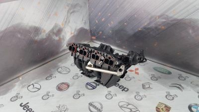 Лот: 23589021. Фото: 1. Коллектор впускной Opel Corsa... Двигатель и элементы двигателя