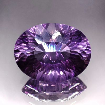 Лот: 21521366. Фото: 1. 22.16 ct. Аметист овал. Боливия... Драгоценные и поделочные камни