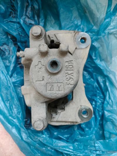 Лот: 20907865. Фото: 1. Суппорт Mitsubishi Pajero Mini... Тормозная система
