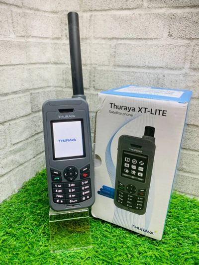 Лот: 20349529. Фото: 1. Спутниковый телефон Thuraya XT-lite... Проводные телефоны