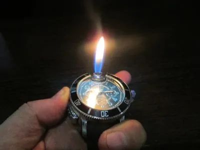 Лот: 22570169. Фото: 1. Наручные часы-зажигалка (белый... Гирлянды, шарики, новогодние аксессуары