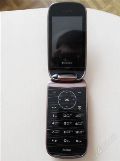 Лот: 2701867. Фото: 1. Сотовый телефон Philips Xenium... Кнопочные мобильные телефоны
