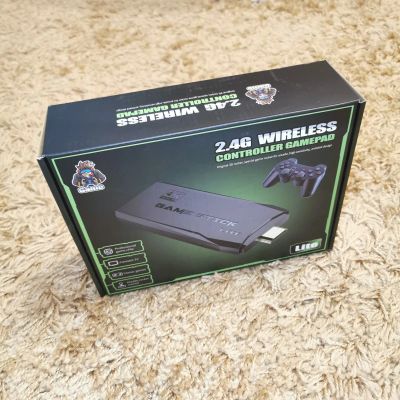 Лот: 20127082. Фото: 1. Игровая приставка Game Stick Lite... Игровые приставки, консоли