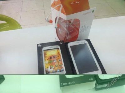 Лот: 2830669. Фото: 1. Сотовый телефон Fly IQ 450Horizon. Смартфоны