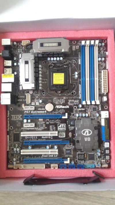Лот: 14848111. Фото: 1. Материнская плата ASRock P67 extreme4. Материнские платы