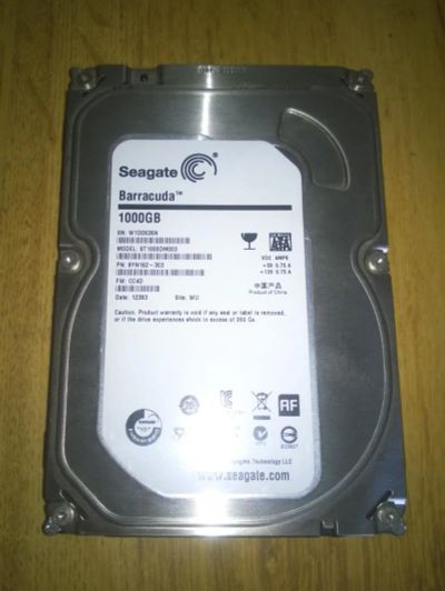 Лот: 5910066. Фото: 1. Жесткий диск Seagate ST1000DM003... Жёсткие диски (HDD)