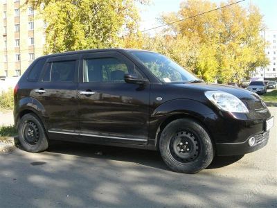 Лот: 1205163. Фото: 1. Mazda Verisa 2005 черная. Автомобили