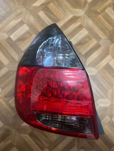 Лот: 23912063. Фото: 1. Фара задняя Honda Fit 2004. Другое (автозапчасти)