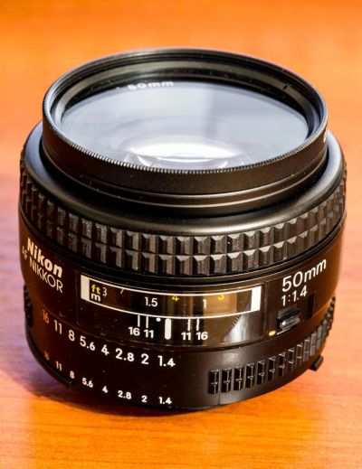 Лот: 10816763. Фото: 1. Nikon AF Nikkor 50mm F1.4 made... Объективы