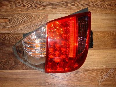 Лот: 555043. Фото: 1. Фара задняя левая HONDA FIT.JAZ... Оптика и освещение
