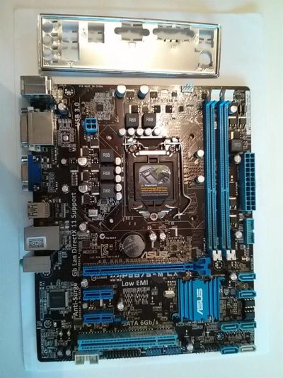 Лот: 3007430. Фото: 1. материнская плата с сокетом LGA1155... Материнские платы