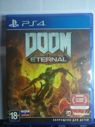 Лот: 15690801. Фото: 1. Doom eternal PS4 дисковая версия. Игры для консолей
