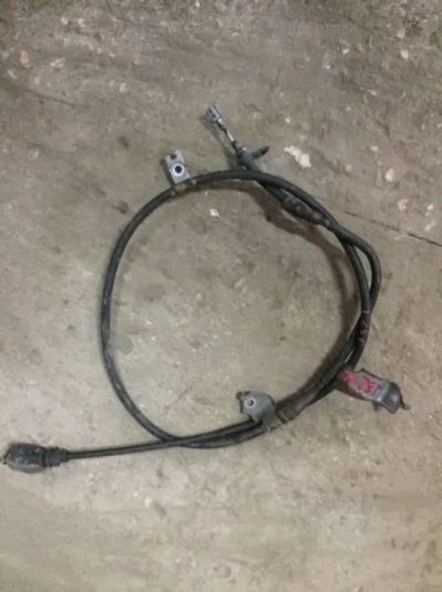 Лот: 21413581. Фото: 1. Тросик ручного тормоза Nissan... Двигатель и элементы двигателя