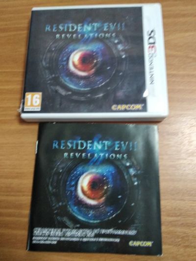 Лот: 15090265. Фото: 1. Resident Evil Revelations. Оригинальный... Игры для консолей