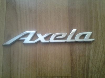 Лот: 10573583. Фото: 1. Эмблема багажника Mazda Axela. Кузов