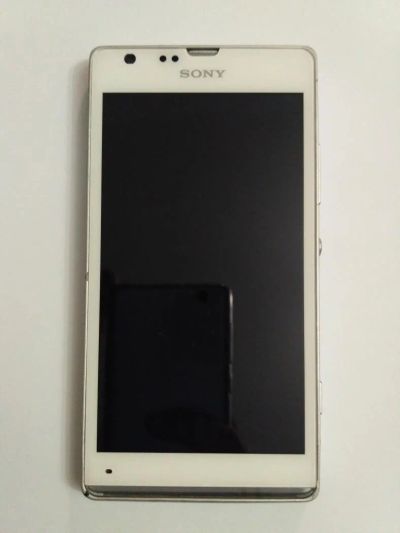 Лот: 8218033. Фото: 1. Sony Xperia SP + кожаный чехол... Смартфоны