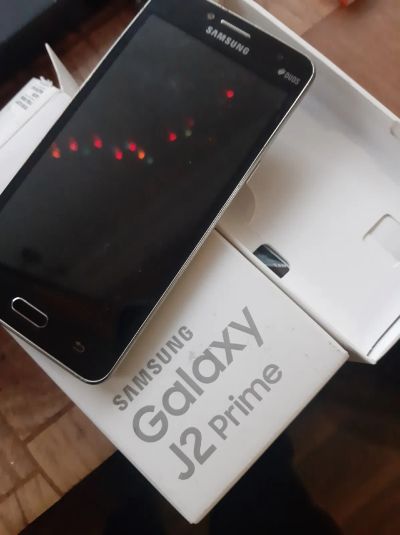 Лот: 19818999. Фото: 1. Samsung j2 prime. Смартфоны