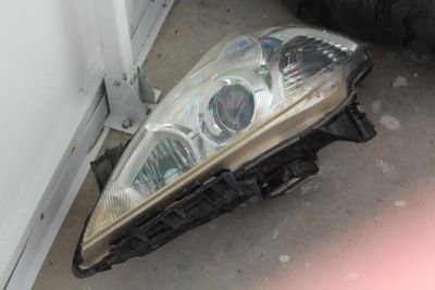 Лот: 5491315. Фото: 1. Блок фары Nissan Tiida. Оптика и освещение