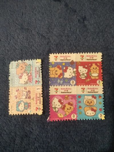 Лот: 25776526. Фото: 1. Марки Hello Kitty из 7 11. Марки