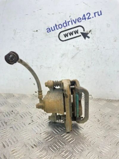 Лот: 25026117. Фото: 1. суппорт тормозной Nissan Qashqai... Тормозная система