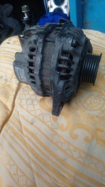 Лот: 11774738. Фото: 1. Генератор mazda demio dy3w 2003. Электрооборудование