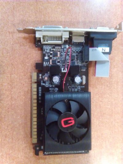 Лот: 9550004. Фото: 1. видеокарта PCI-E GT210 1Gb DDR3... Видеокарты