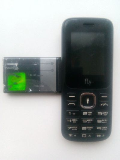 Лот: 17020962. Фото: 1. Сотовый телефон Fly FF117 с рубля. Кнопочные мобильные телефоны