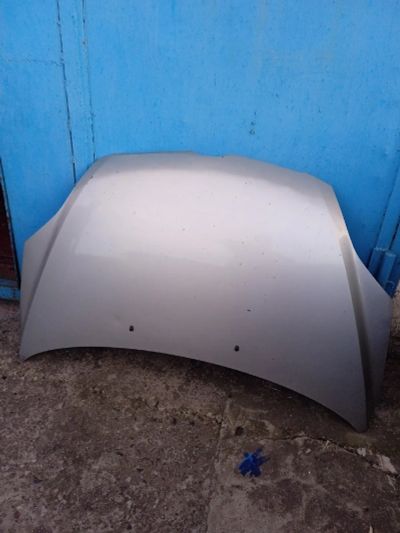 Лот: 19134750. Фото: 1. Капот Mazda Demio. Кузов