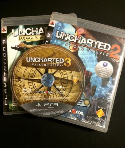 Лот: 7111799. Фото: 1. uncharted все три части для playstation... Игры для консолей