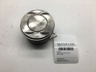 Лот: 20387975. Фото: 1. Поршень Mazda Tribute 2002 AJ0311100A... Двигатель и элементы двигателя