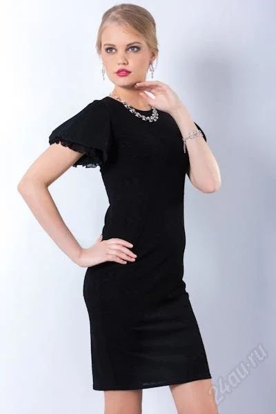 Лот: 2362264. Фото: 1. Эффектное платье с необычной отделкой... Платья