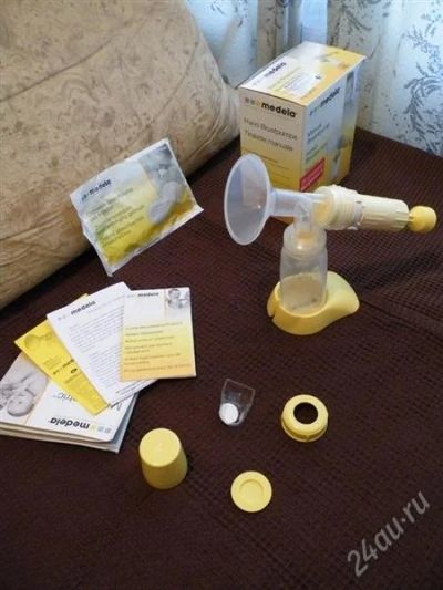 Лот: 2068534. Фото: 1. Молокоотсос MEDELA ручной. Всё для кормления