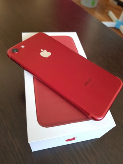 Лот: 11716424. Фото: 1. iPhone 7 RED 128GB (еще на гарантии... Смартфоны