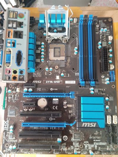 Лот: 17890749. Фото: 1. MSI Z77A-G43. Материнские платы