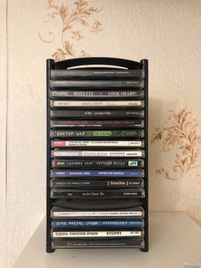 Лот: 15231454. Фото: 1. Подставка под CD м dvd новая в... Видеозаписи, фильмы