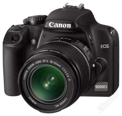 Лот: 1019389. Фото: 1. Canon EOS 1000D kit 18-55;+аккумулятор... Цифровые зеркальные