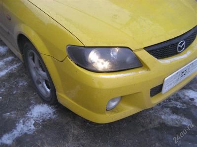 Лот: 846419. Фото: 1. Фары Mazda Familia. Оптика и освещение