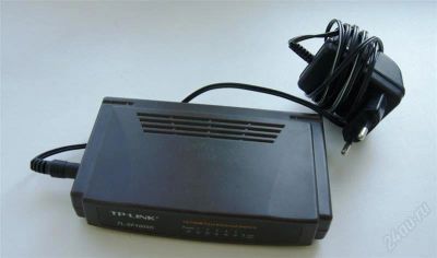 Лот: 2730877. Фото: 1. Коммутатор TP-LINK TL-SF1005D. Маршрутизаторы (роутеры)